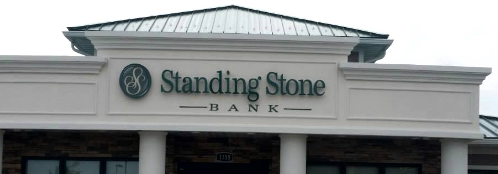 standing stone sign